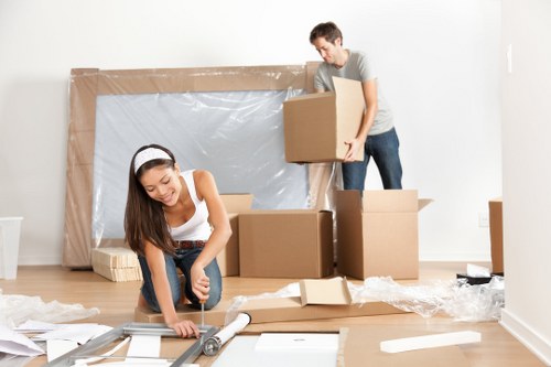 Professional mover carrying furniture for a local relocation