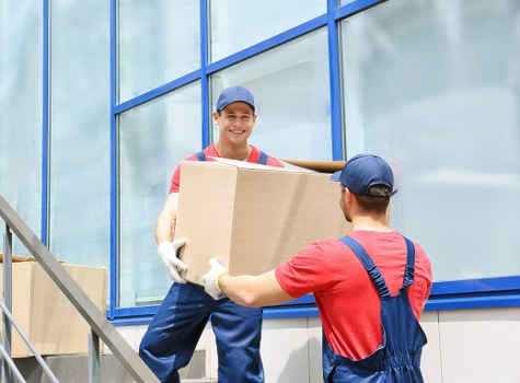 Professional removal team planning a house move in Roehampton