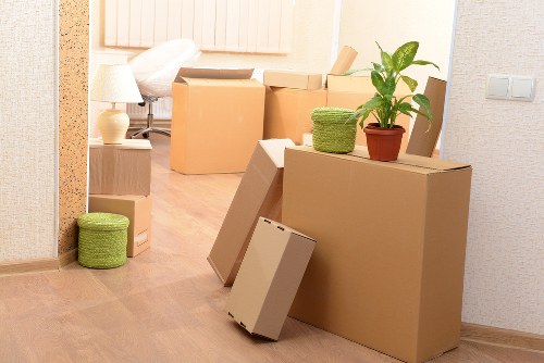 Removal team handling furniture during transport
