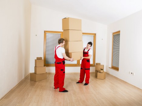Experienced movers completing a furniture removal job in Roehampton